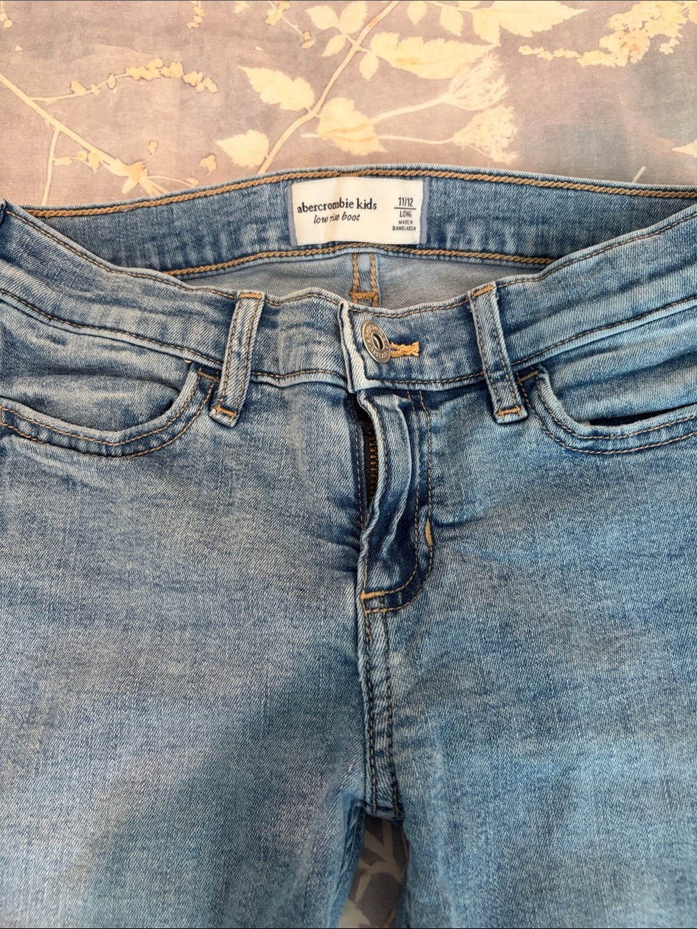 abercrombie kids faded blue low rise boot jeans
